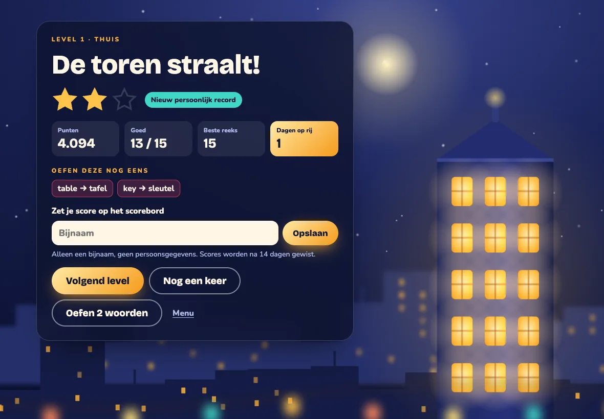 Level klaar: de toren straalt, met sterren, punten en de woorden om te oefenen